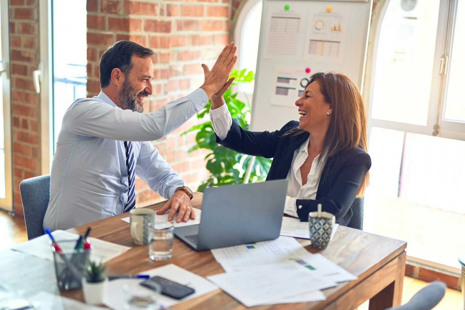 Marketing team planning a campaign at a conference table