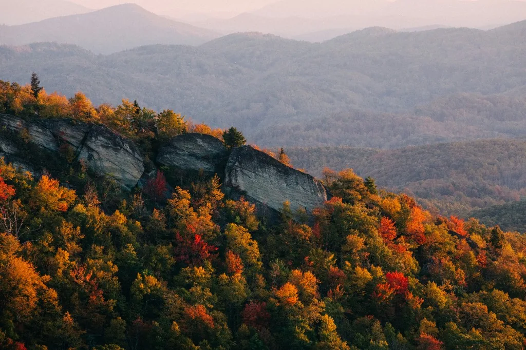 Autumn mountain landscape in North Carolina with colorful fall foliage and blue ridge peaks