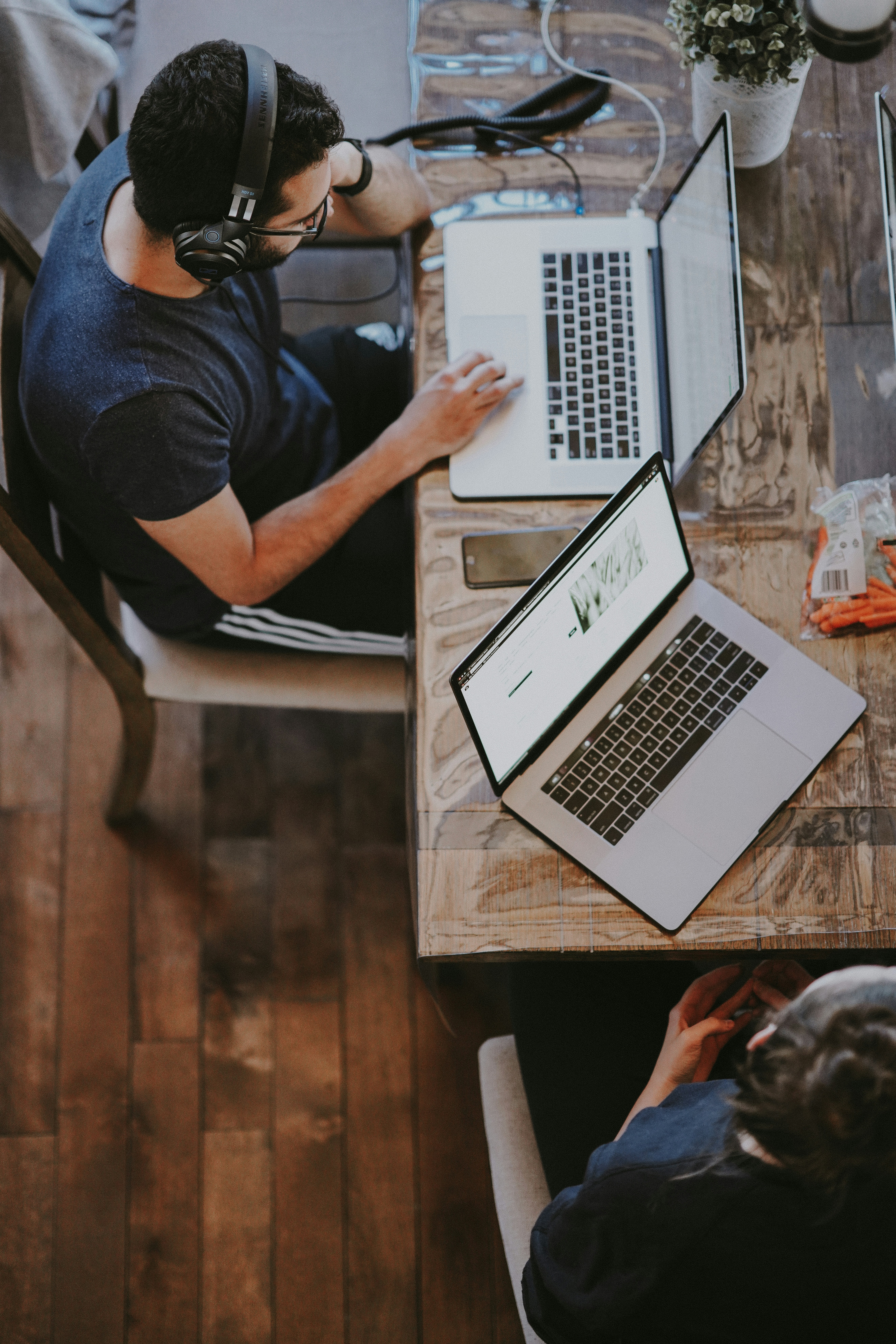 Early-stage startup team collaborating around a shared workspace