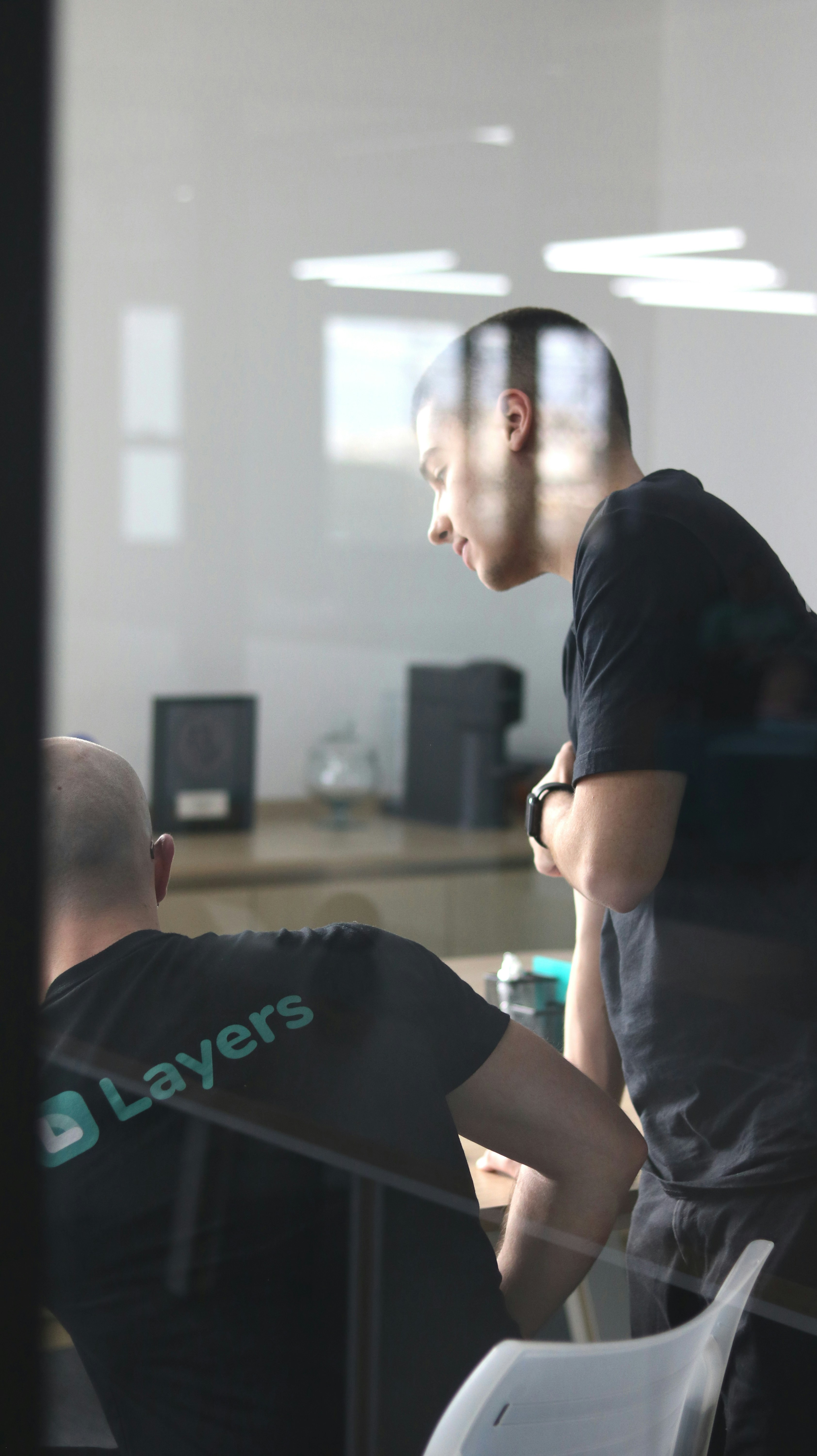Growing startup team working together in an open office